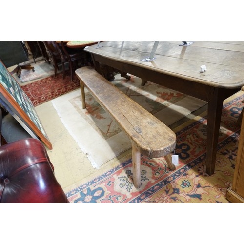 51 - A pair of 19th century provincial elm and beech bench seats, length 199cm, depth 23cm, height 48cm... 