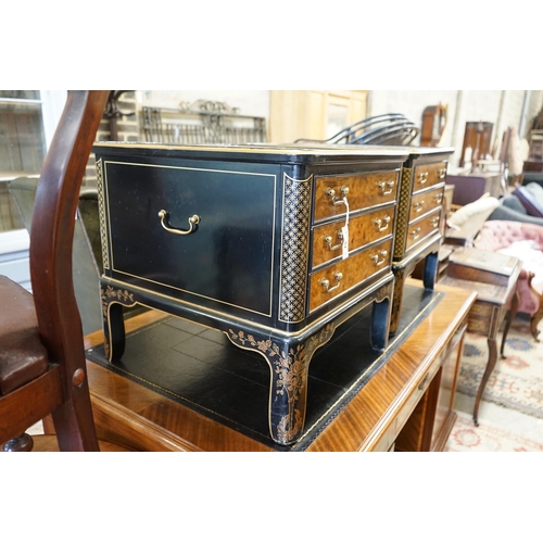 54 - A pair of Drexel chinoiserie decorated, ebonised and pollard oak three drawer tables with glass tops... 