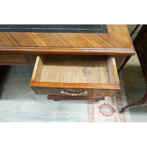 55 - A mid 20th century French satinwood banded mahogany pedestal partner's desk, length 150cm, depth 98c... 