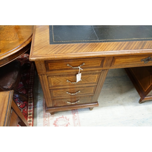 55 - A mid 20th century French satinwood banded mahogany pedestal partner's desk, length 150cm, depth 98c... 