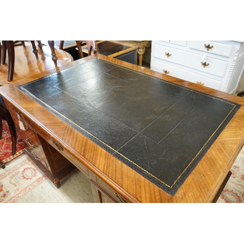 55 - A mid 20th century French satinwood banded mahogany pedestal partner's desk, length 150cm, depth 98c... 