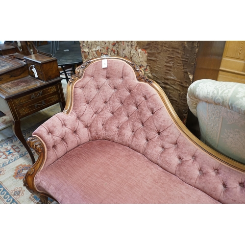 57 - A Victorian faded rosewood chaise longue upholstered in buttoned pink dralon, length 190cm,  width 8... 