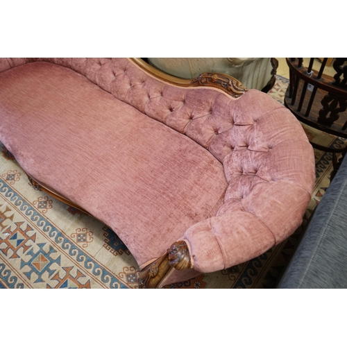 57 - A Victorian faded rosewood chaise longue upholstered in buttoned pink dralon, length 190cm,  width 8... 