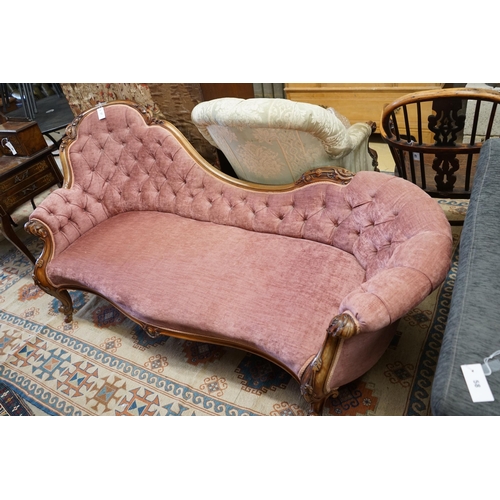 57 - A Victorian faded rosewood chaise longue upholstered in buttoned pink dralon, length 190cm,  width 8... 