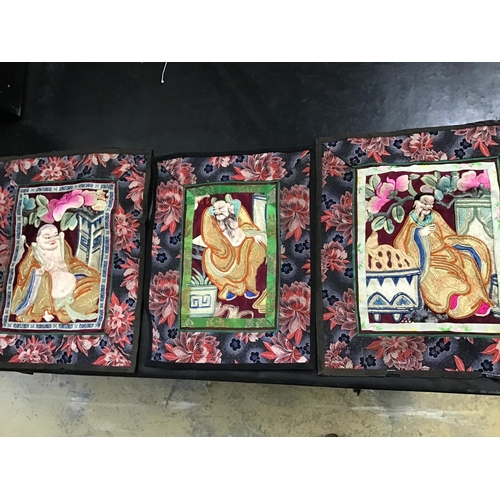 63 - Three Chinese embroidered robe panels, each width 26cm, height 32cm