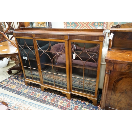 80 - A 1920's Chippendale revival mahogany breakfront bookcase, length 154cm, depth 22cm, height 120cm... 