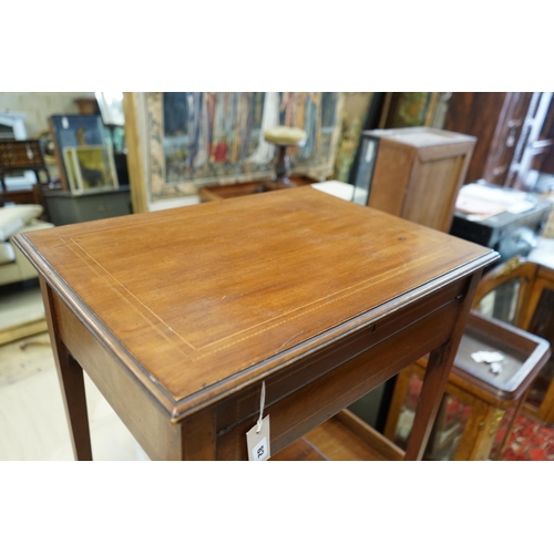 82 - An Edwardian rectangular mahogany hinged top writing table, width 62cm, depth 45cm, height 74cm... 