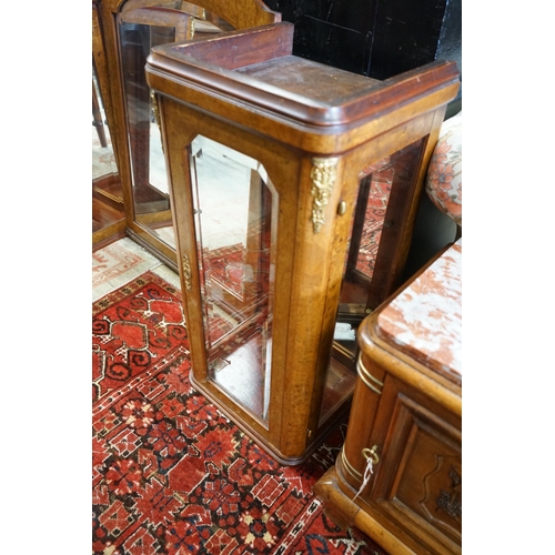 84 - A pair of early 20th French birds eye maple glazed cabinets and central mirror, formerly a cabinet s... 