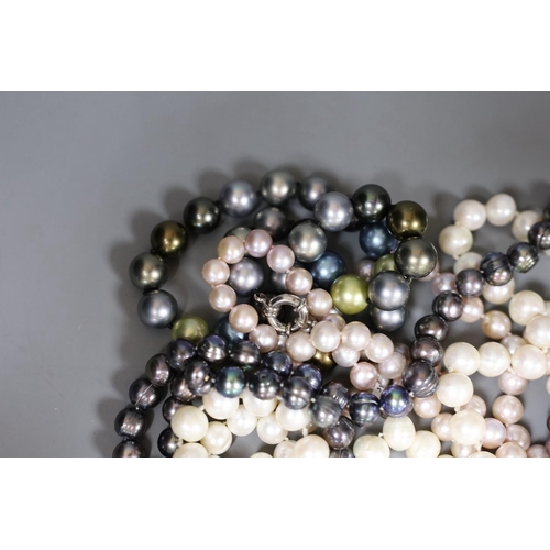 976 - Thirteen assorted modern freshwater pearl necklaces, longest 116cm.