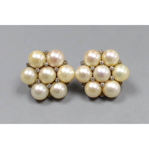 980 - A pair of Indian white metal, cultured pearl and diamond chip cluster earrings, gross 22.7 grams, di... 