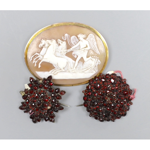 981 - Two Victorian garnet set brooches, largest 3.5cm and a gold mounted cameo brooch, 5.5cm