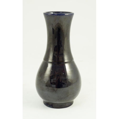 103 - A small Chinese aubergine glazed vase, 18th century, of baluster form, unglazed base, 16.4cm high... 