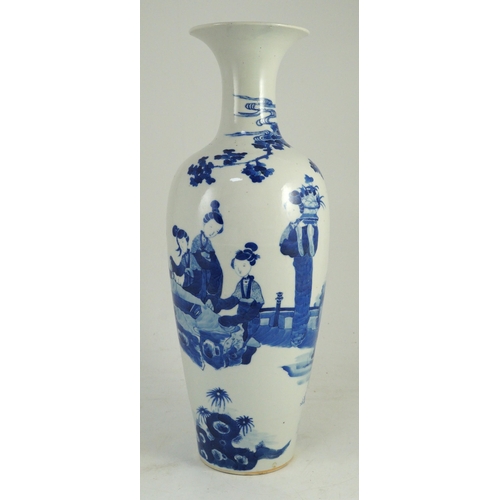 115 - A tall Chinese blue and white ladies vase, laifu zun, 19th century, painted with ladies in a fenced ... 