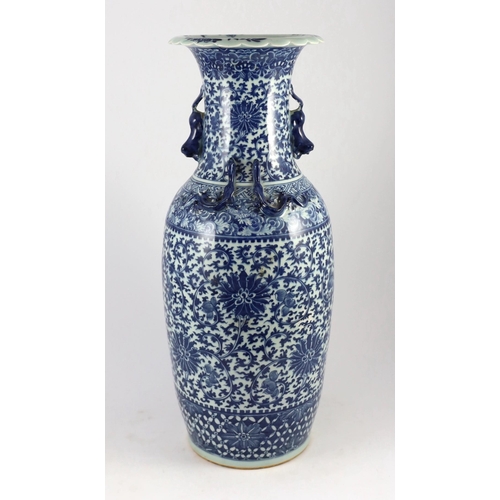 117 - A large Chinese blue and white lotus vase, 19th century, painted with lotus flowers and scrolling ... 