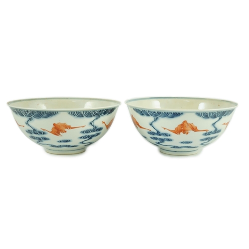 119 - A pair of Chinese iron red and underglaze blue five bat bowls, Guangxu mark and probably of the pe... 