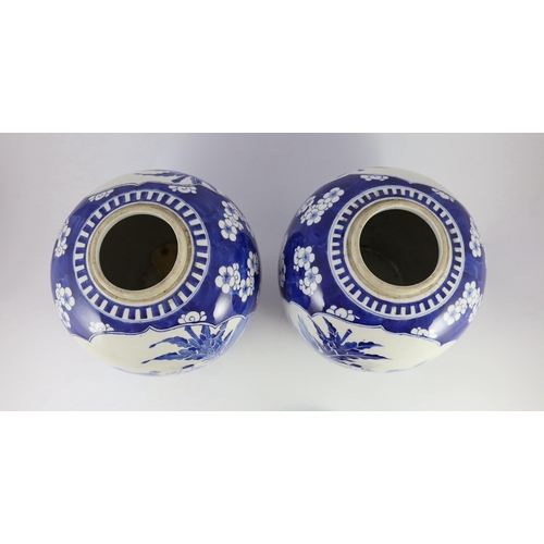 122 - A pair of large Chinese blue and white jars and covers, 19th century, painted to each side with a la... 