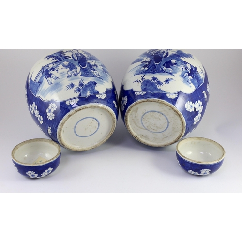 122 - A pair of large Chinese blue and white jars and covers, 19th century, painted to each side with a la... 