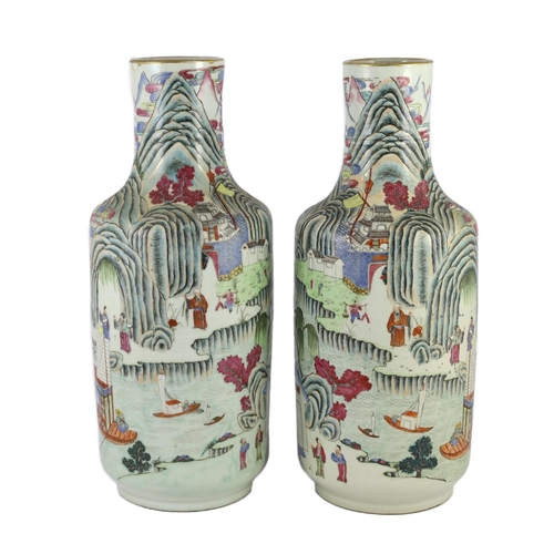 128 - A pair of Chinese famille rose fencai inscribed vases, mid 19th century, each well painted with scho... 