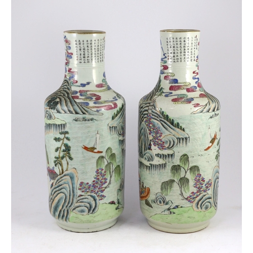 128 - A pair of Chinese famille rose fencai inscribed vases, mid 19th century, each well painted with scho... 