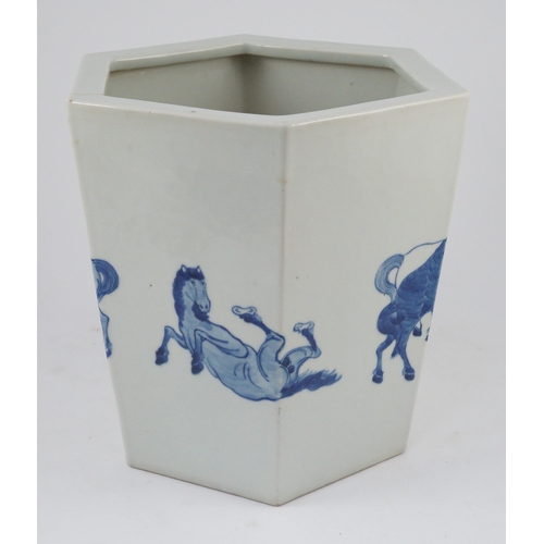 133 - A Chinese blue and white hexagonal jardiniere, Kangxi mark but 19th/20th century, painted with the e... 