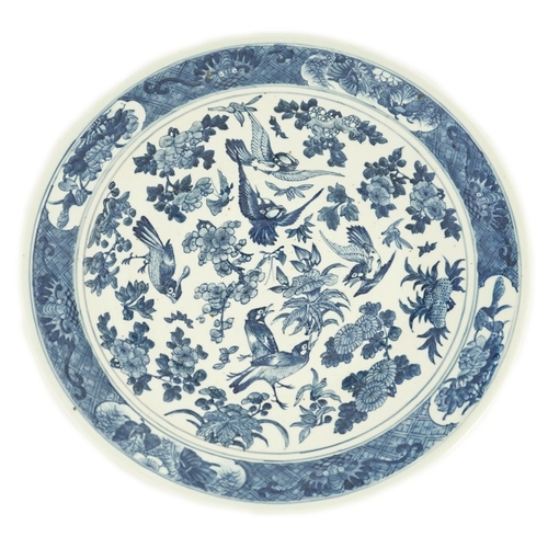 138 - A Chinese blue and white 'blackbird' dish, 19th century, painted with blackbirds amid floral sprays,... 