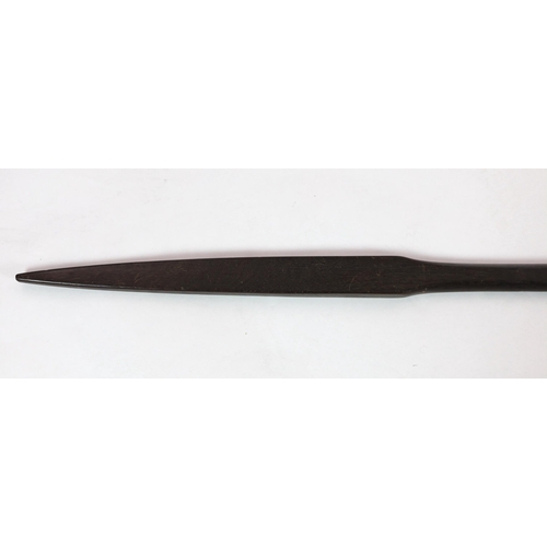 14 - A Polynesian hardwood double ended spear, of flattened form with rounded central handle, 173cm long... 