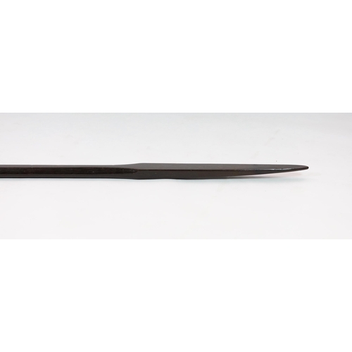 14 - A Polynesian hardwood double ended spear, of flattened form with rounded central handle, 173cm long... 