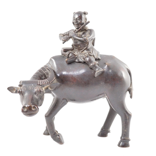 162 - A Chinese bronze boy riding a water buffalo censer, 17th/18th century, the figure of a boy playing... 