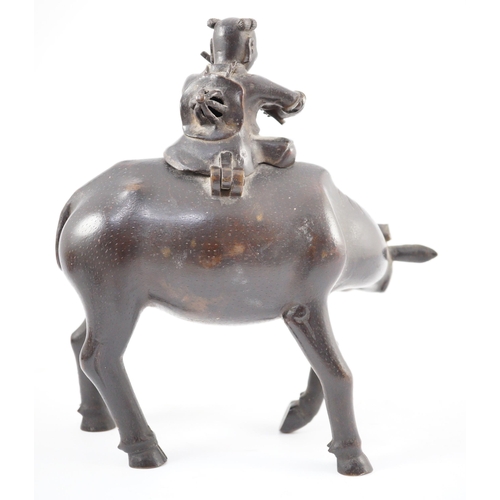 162 - A Chinese bronze boy riding a water buffalo censer, 17th/18th century, the figure of a boy playing... 