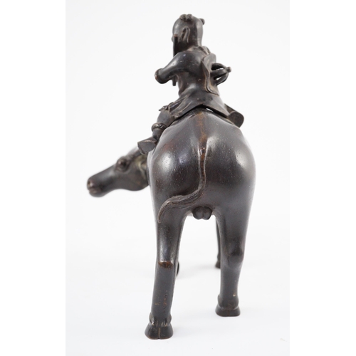 162 - A Chinese bronze boy riding a water buffalo censer, 17th/18th century, the figure of a boy playing... 