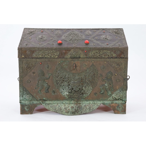 164 - A Tibetan copper repousse-work casket, 20th century, the arched cover and side panels decorated with... 