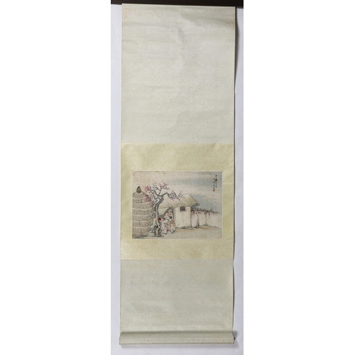 168 - A Chinese scroll painting on paper of a sage and a boy in a hut, early 20th century, inscribed and w... 