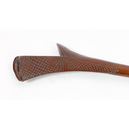 17 - A Fijian hardwood bladed war club, with relief carved decoration, 101cm long