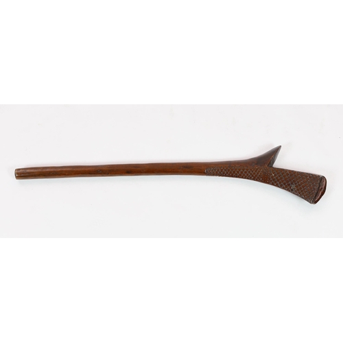 17 - A Fijian hardwood bladed war club, with relief carved decoration, 101cm long