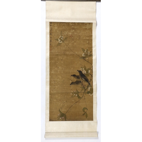 170 - A Chinese scroll painting on silk of blackbirds perched on a blossoming branch, 19th century, inscri... 