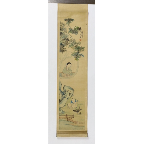 174 - A Chinese scroll painting on silk of a mother watching her children play in a garden, 19th century, ... 