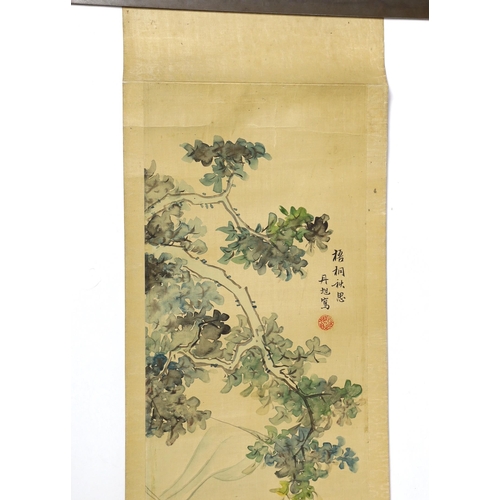 174 - A Chinese scroll painting on silk of a mother watching her children play in a garden, 19th century, ... 