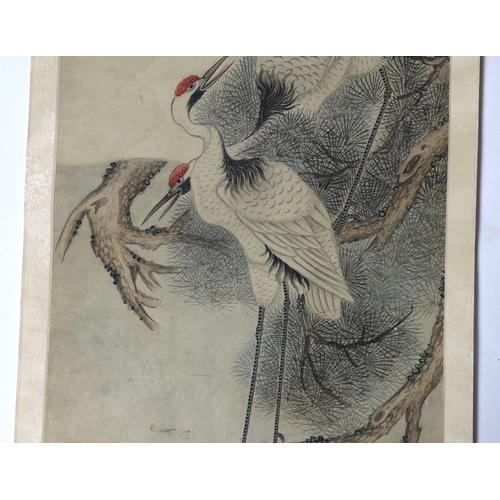 175 - A Chinese scroll painting on paper of cranes perched in a pine tree, 19th century, inscribed upper l... 