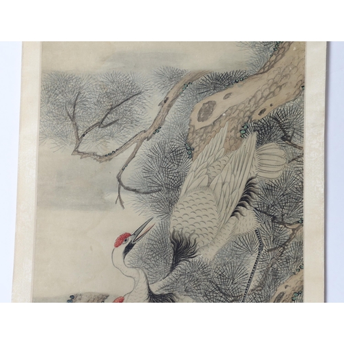 175 - A Chinese scroll painting on paper of cranes perched in a pine tree, 19th century, inscribed upper l... 