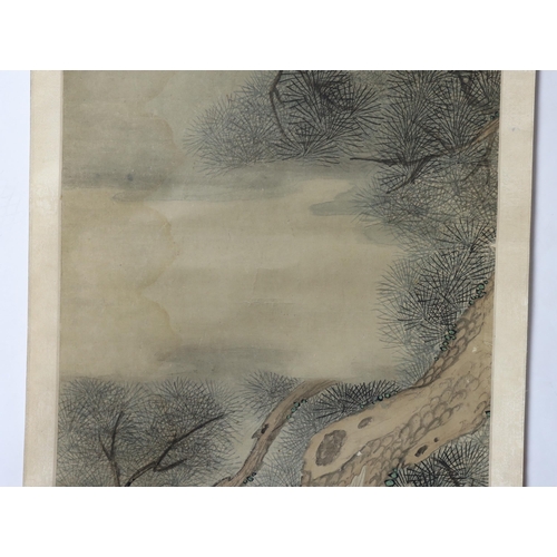 175 - A Chinese scroll painting on paper of cranes perched in a pine tree, 19th century, inscribed upper l... 