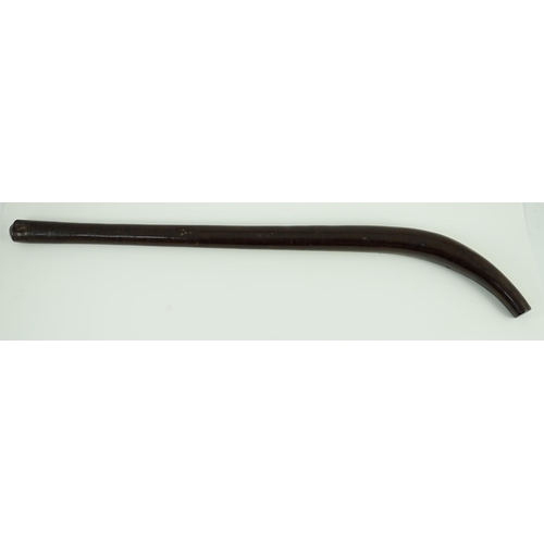 18 - A Fijian curved hardwood dancing club, of rounded tapered form, 62cm long