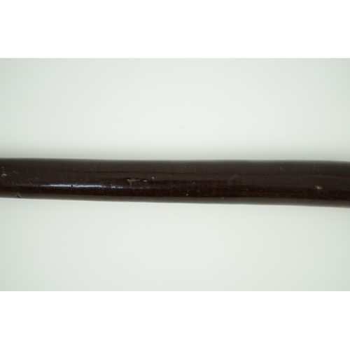 18 - A Fijian curved hardwood dancing club, of rounded tapered form, 62cm long