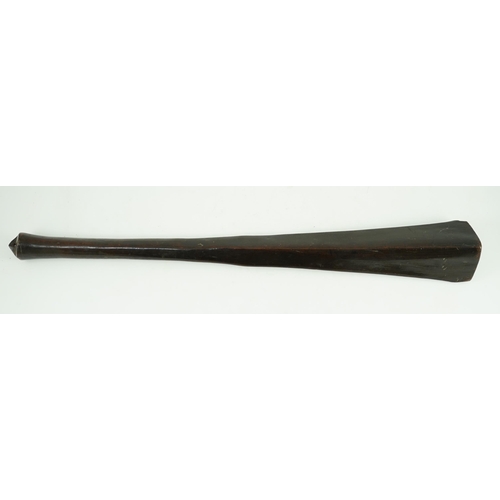 19 - A Bowai Fijian hardwood war club, of tapered triangular section with rounded handle, 65cm long... 