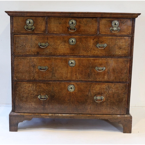 207 - A George II crossbanded walnut chest, of three short and three graduated long drawers, on bracket fe... 