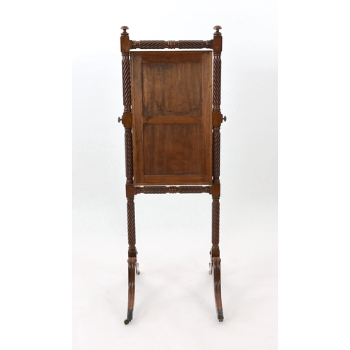 217 - A Regency mahogany cheval glass, with spiral fluted turned frame and moulded downswept legs fitted b... 