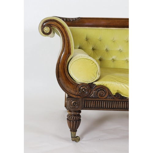 218 - A Regency rosewood settee, with acanthus carved cresting rail, brass paterae inset scroll arms and f... 