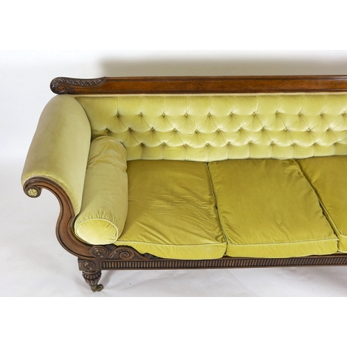 218 - A Regency rosewood settee, with acanthus carved cresting rail, brass paterae inset scroll arms and f... 