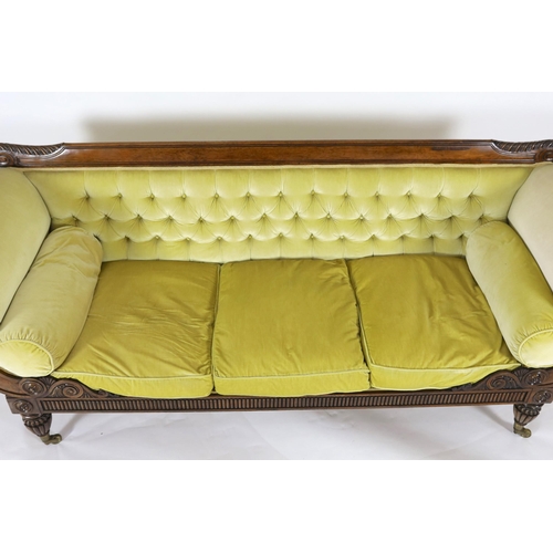 218 - A Regency rosewood settee, with acanthus carved cresting rail, brass paterae inset scroll arms and f... 