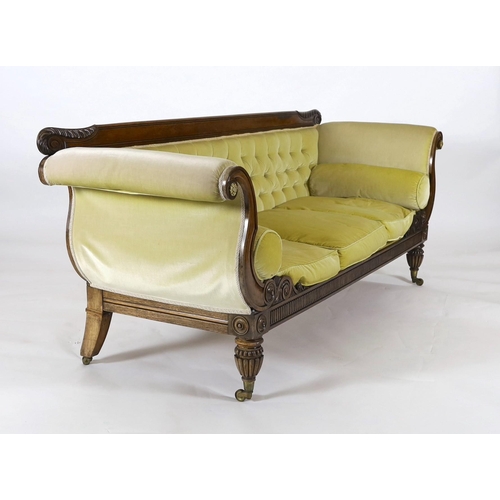 218 - A Regency rosewood settee, with acanthus carved cresting rail, brass paterae inset scroll arms and f... 