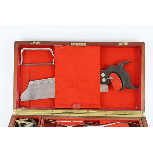 22 - A Victorian mahogany cased field surgeon's set by Salt & Son of Bull Lane, London, the brass bound m... 